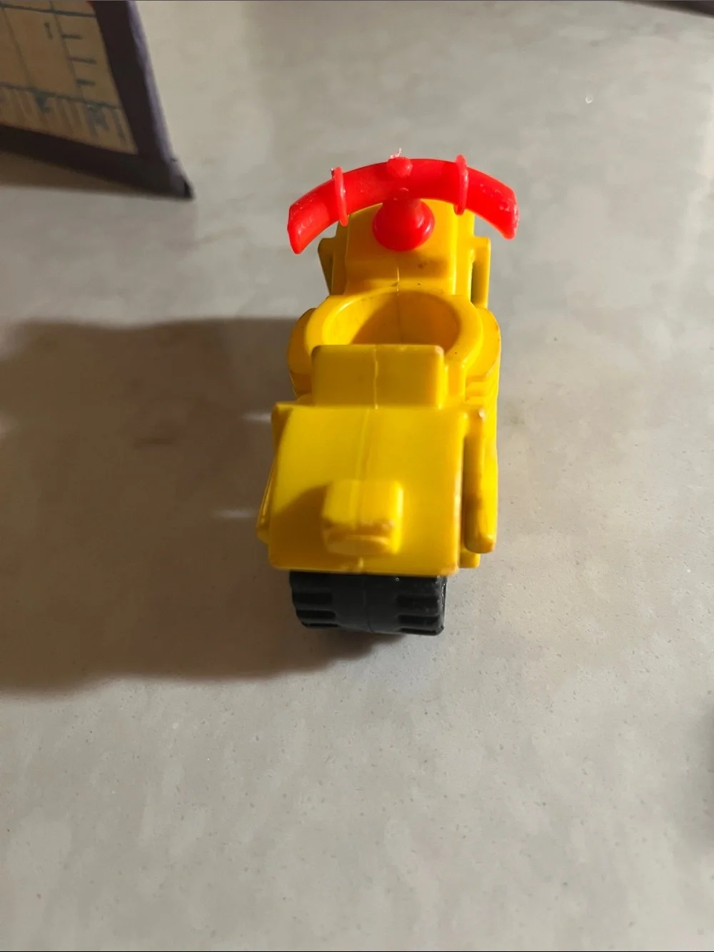 Vintage Fisher Price motorcycle with policeman